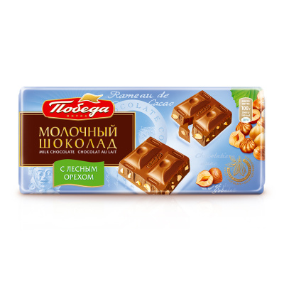ПОБЕДА ШОКОЛАД МОЛОЧНЫЙ С КУСОЧКАМИ ЛЕСНОГО ОРЕХА 100Г фото в интернет-аптеке Склад Лекарств