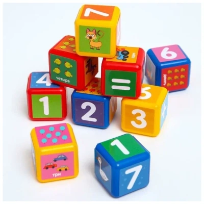 ИГРУШКА ОБУЧАЮЩИЕ КУБИКИ СИНИЙ ТРАКТОР УЧИМ ЦИФРЫ 9 ШТ 40 Х 40 ММ фото в интернет-аптеке Склад Лекарств